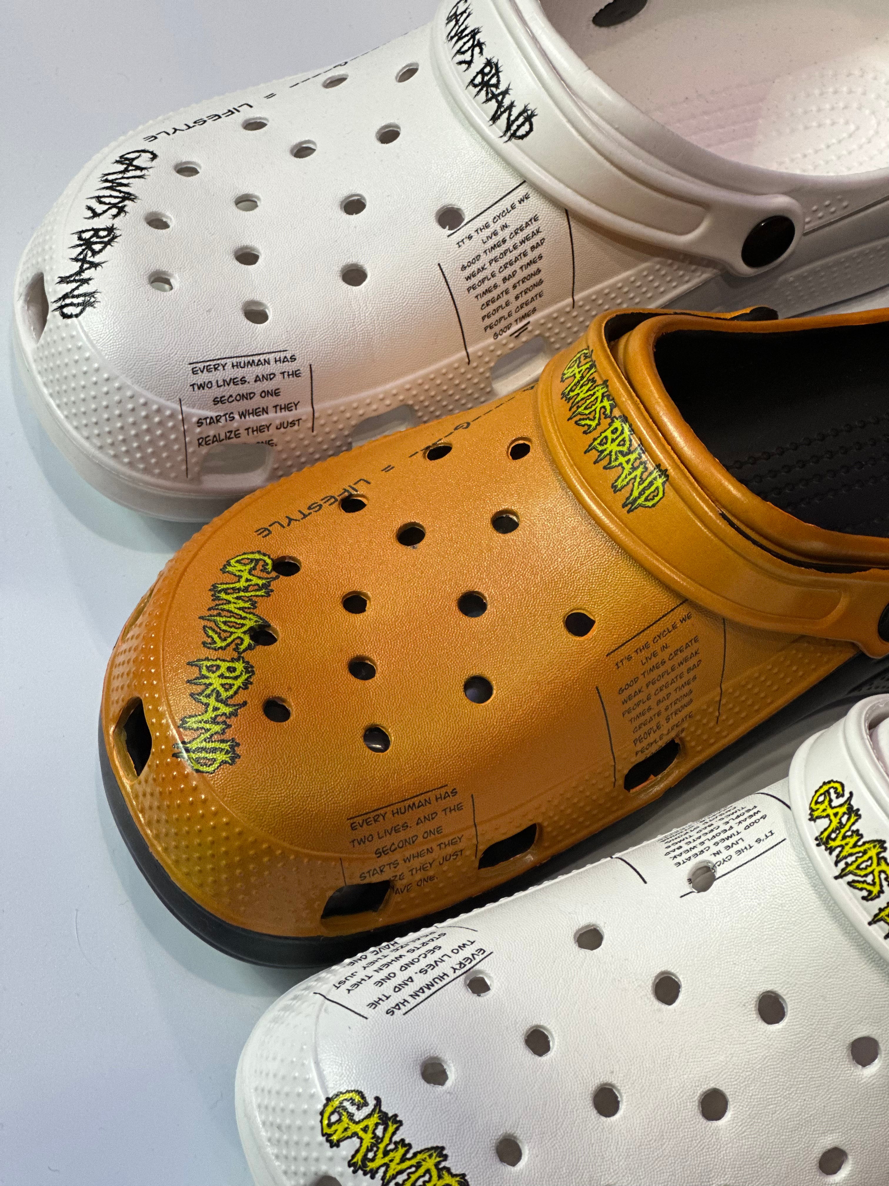 Orange ￼Gawds croc shoes ￼